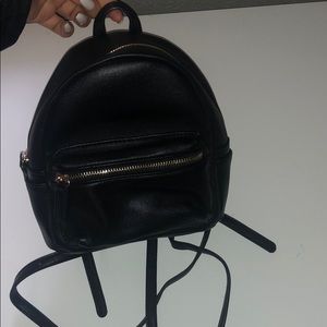 Mini black backpack